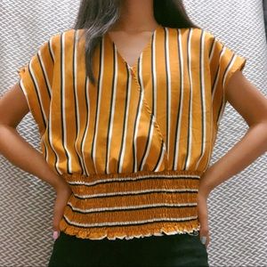 slightly worn lipslide mustard striped top